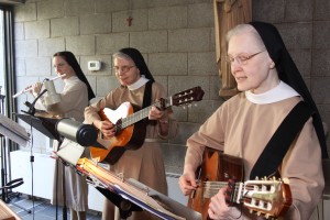 Sr. Anne (flute), Sr. Jean and Sr. Evelyn (guitars) playing for the Celebration of the Eucharist